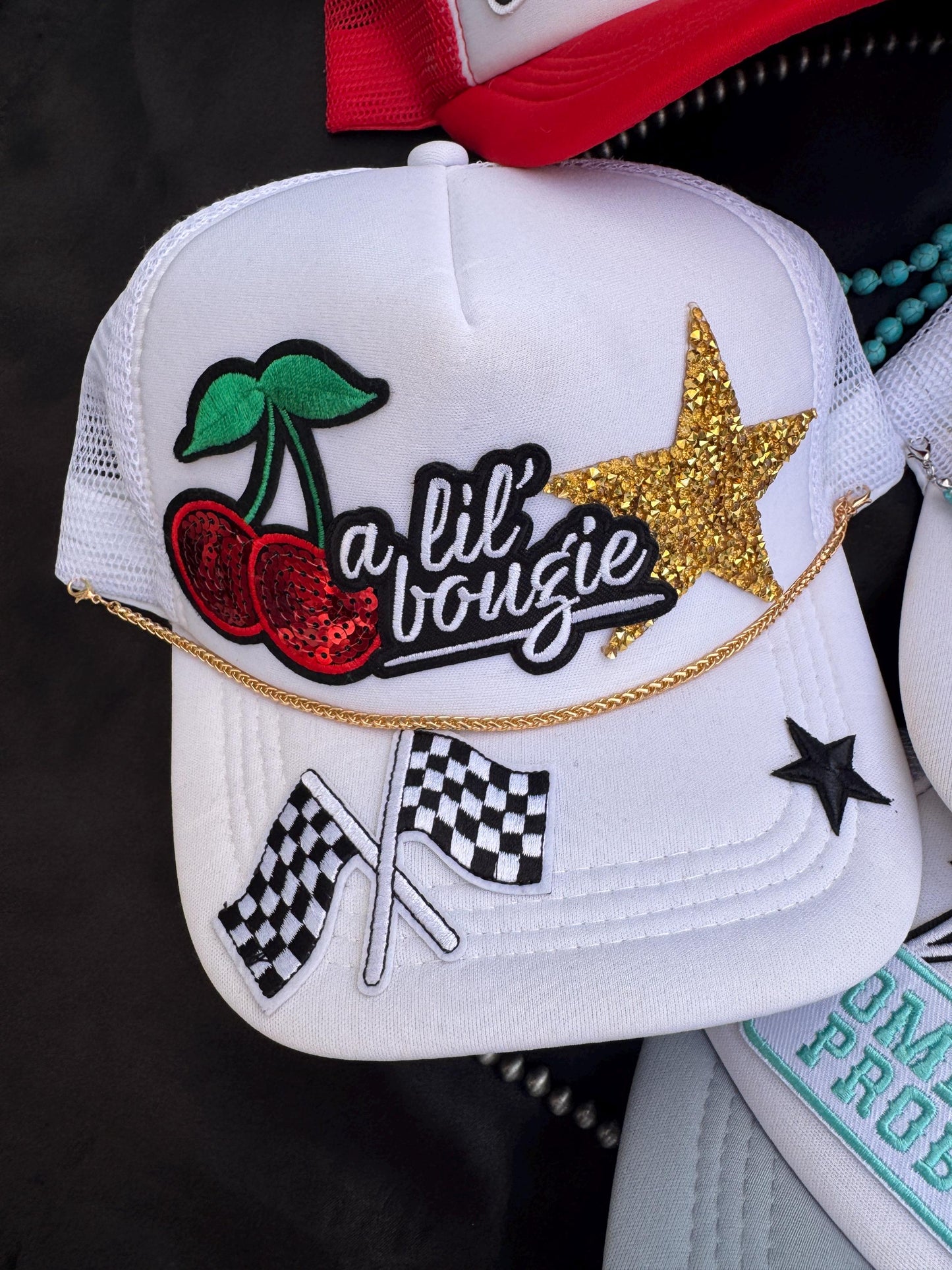 A Lil bougie trucker hat